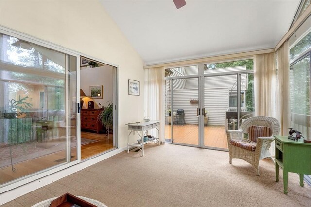 sunroom / solarium with vaulted ceiling and ceiling fan