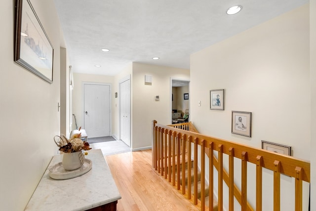 hallway featuring light hardwood / wood-style floors