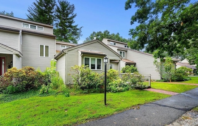 view of front of home with a front yard