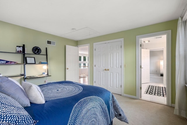 carpeted bedroom with a closet