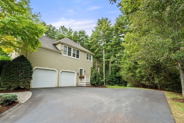 view of home's exterior featuring a garage