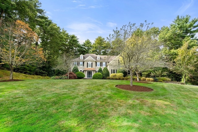 view of front of property with a front lawn