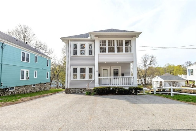 view of front of property featuring covered porch