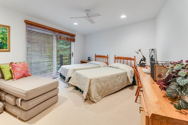 carpeted bedroom featuring ceiling fan and access to outside