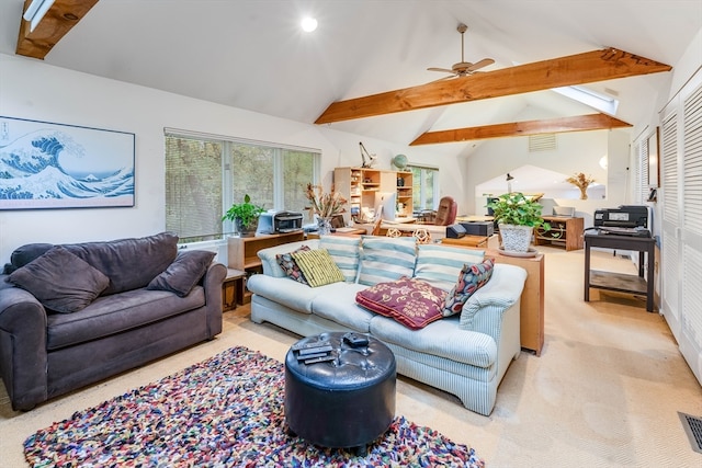 living room featuring light carpet, beam ceiling, and ceiling fan