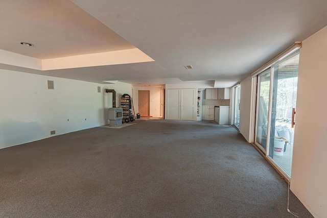 unfurnished living room with carpet flooring