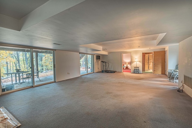 unfurnished living room with carpet floors