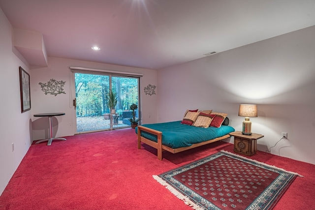 bedroom featuring carpet floors and access to outside