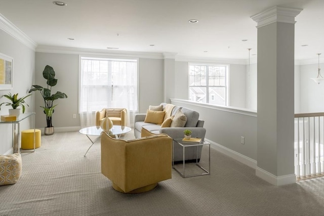 sitting room with recessed lighting, carpet floors, baseboards, decorative columns, and crown molding