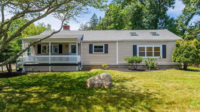 367 Middle Rd, Acushnet, MA 02743 - view of front of house featuring a front lawn, a chimney, roof with shingles, and covered porch