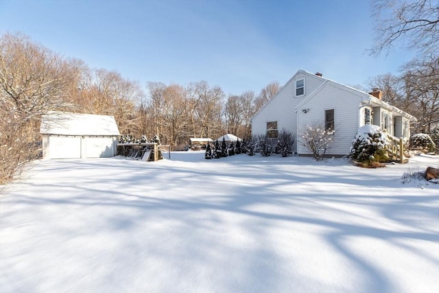 view of snow covered property