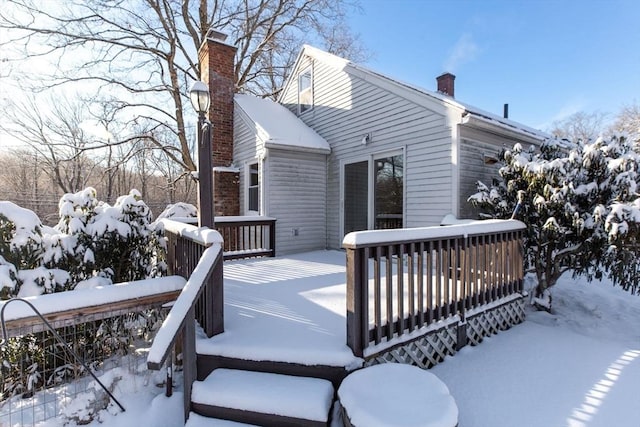 view of snow covered deck