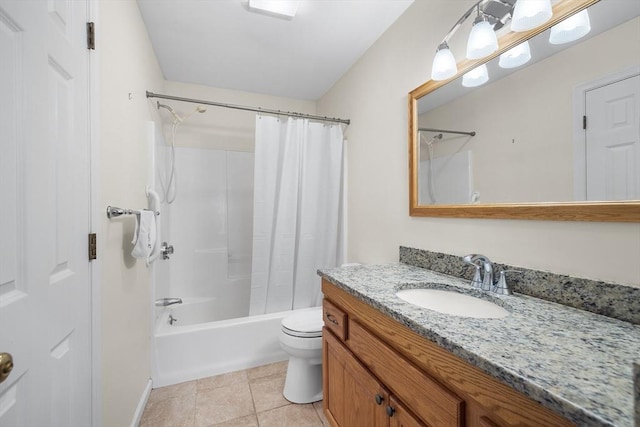 bathroom featuring vanity, tile patterned floors, shower / tub combo, and toilet