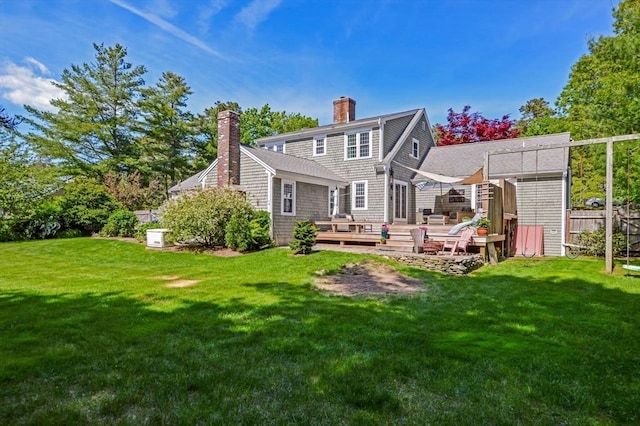 290 Cotuit Bay Dr, Barnstable, MA 02635 - rear view of property with a chimney and a deck