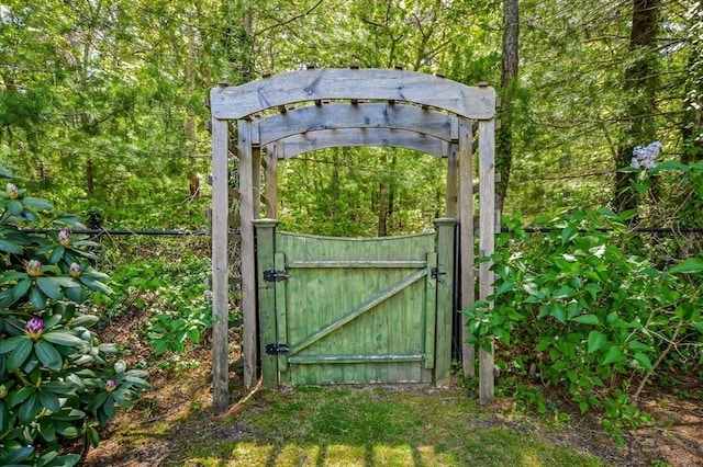 290 Cotuit Bay Dr, Barnstable, MA 02635 - gate with a forest view