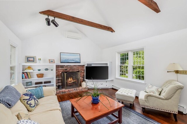 290 Cotuit Bay Dr, Barnstable, MA 02635 - living area featuring wood finished floors, a fireplace, a baseboard heating unit, and a wall mounted AC