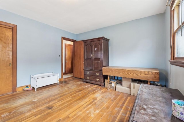 bedroom with light wood-style floors