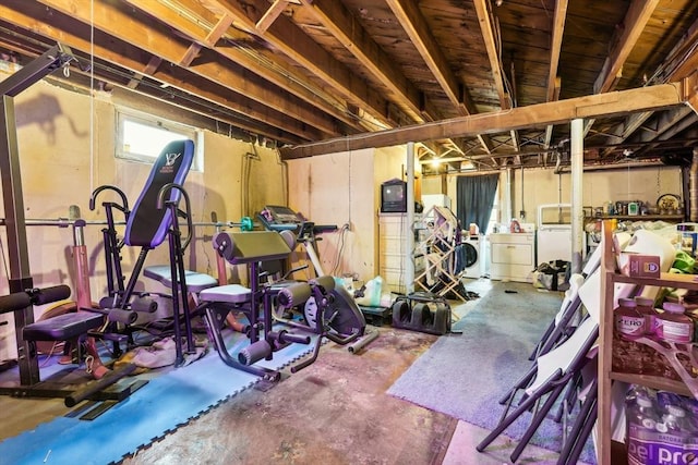 workout room featuring separate washer and dryer