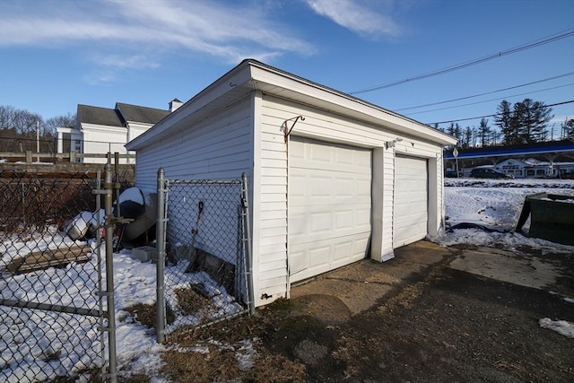 view of snow covered garage