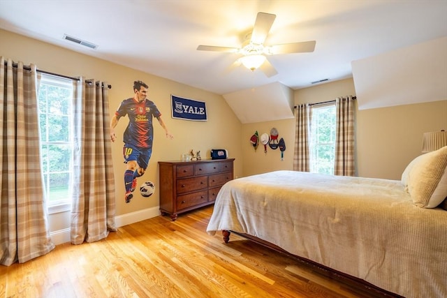 29 Hoveys Pond Dr, Boxford, MA 01921 - bedroom featuring multiple windows, light wood-style floors, vaulted ceiling, and ceiling fan