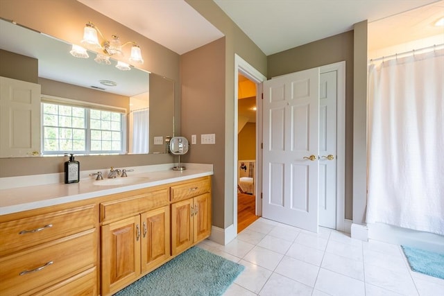 29 Hoveys Pond Dr, Boxford, MA 01921 - bathroom with vanity, tile patterned floors, a shower with shower curtain, and ensuite bath