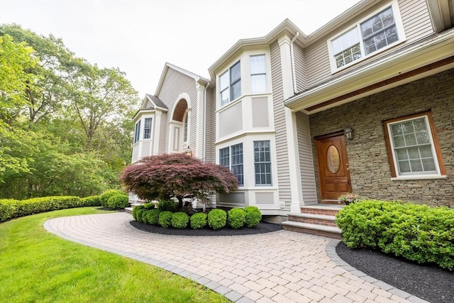 29 Hoveys Pond Dr, Boxford, MA 01921 - entrance to property featuring a yard and stone siding