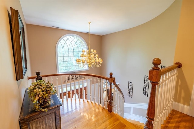 29 Hoveys Pond Dr, Boxford, MA 01921 - stairs featuring wood finished floors and a chandelier