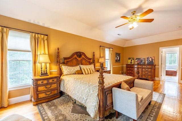 29 Hoveys Pond Dr, Boxford, MA 01921 - bedroom with light wood finished floors, connected bathroom, ceiling fan, and vaulted ceiling