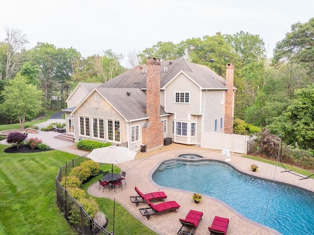 29 Hoveys Pond Dr, Boxford, MA 01921 - view of pool featuring a patio area, a fenced backyard, french doors, outdoor dining area, and a pool with connected hot tub