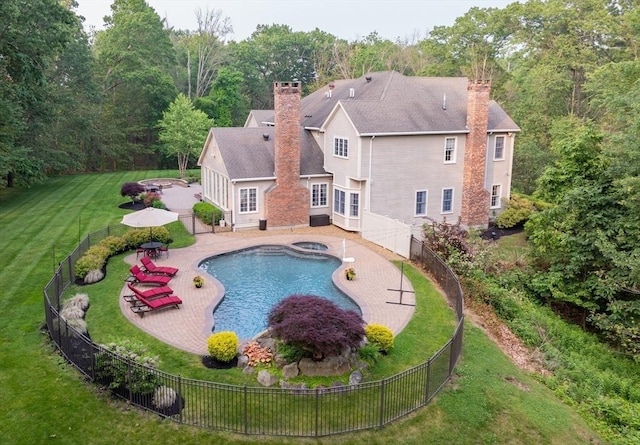 29 Hoveys Pond Dr, Boxford, MA 01921 - view of swimming pool with a fenced backyard, a pool with connected hot tub, and a patio area