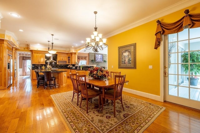 29 Hoveys Pond Dr, Boxford, MA 01921 - dining area with ornamental molding, a chandelier, light wood-style flooring, and recessed lighting
