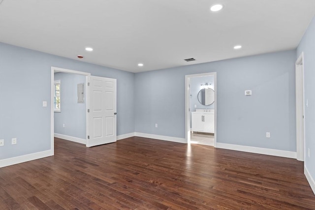 interior space with dark hardwood / wood-style flooring