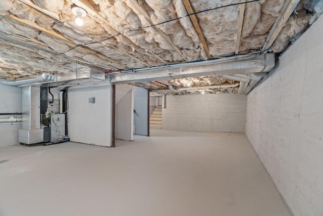 basement featuring heating unit