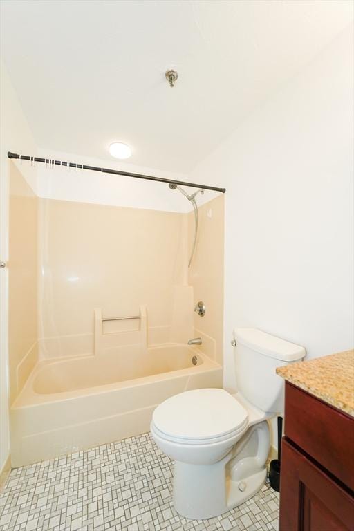 full bathroom featuring vanity, toilet, and washtub / shower combination