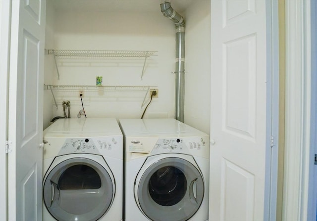 laundry room featuring independent washer and dryer