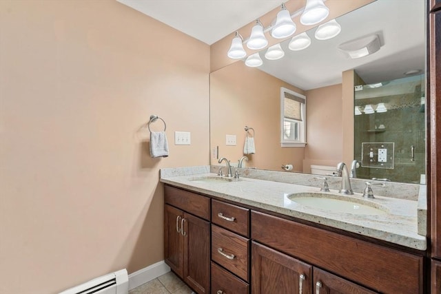 bathroom with tile patterned flooring, a shower stall, toilet, and a sink