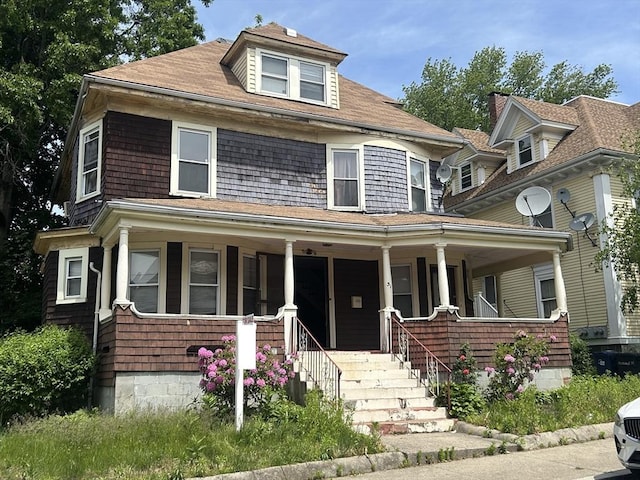 31 Rosedale St, Boston, MA 02124 - view of front of property featuring a porch