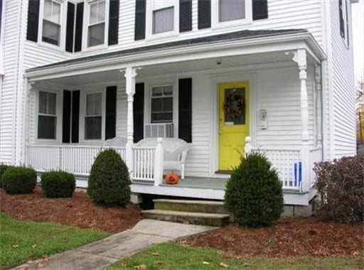 entrance to property with a porch