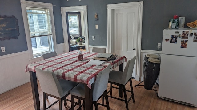 dining room featuring light wood-type flooring