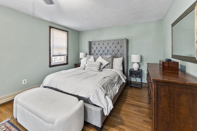 bedroom featuring dark wood-type flooring and ceiling fan