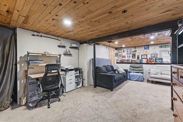 carpeted home office featuring beam ceiling and wood ceiling