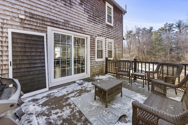 view of snow covered deck