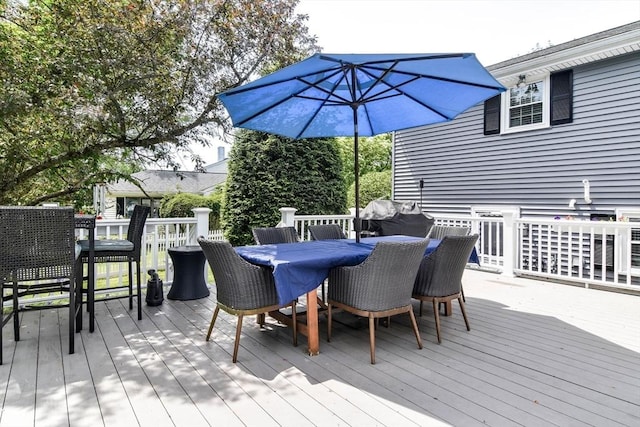 28 Foster Dr, Framingham, MA 01701 - wooden terrace featuring outdoor dining area