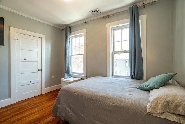350 Wentworth Ave, Lowell, MA 01852 - bedroom featuring wood finished floors, ornamental molding, and baseboards