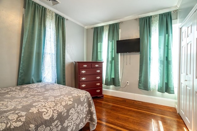 350 Wentworth Ave, Lowell, MA 01852 - bedroom featuring dark wood-type flooring, baseboards, and crown molding