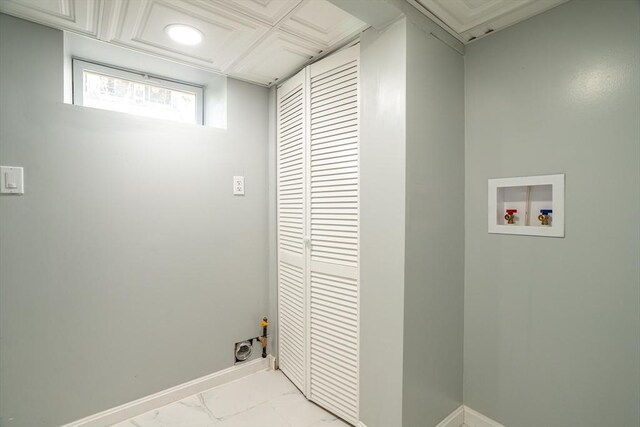 350 Wentworth Ave, Lowell, MA 01852 - laundry area with light marble finish flooring, hookup for a washing machine, hookup for an electric dryer, and baseboards