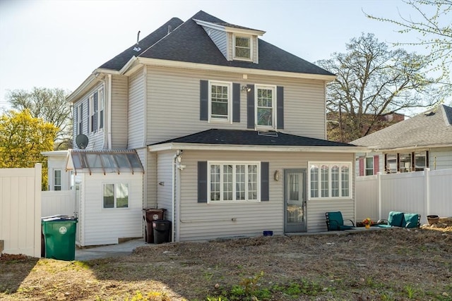 350 Wentworth Ave, Lowell, MA 01852 - rear view of property with fence