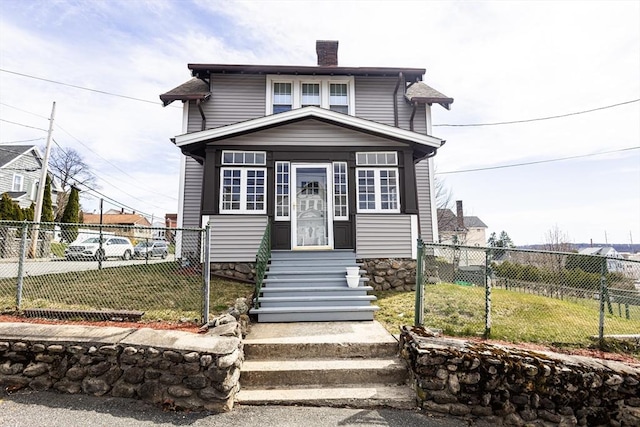 14 Fales St, Worcester, MA 01606 - american foursquare style home featuring fence, a chimney, entry steps, and a front yard