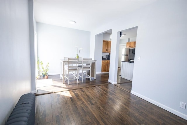 14 Fales St, Worcester, MA 01606 - living room featuring baseboards and dark wood-style floors