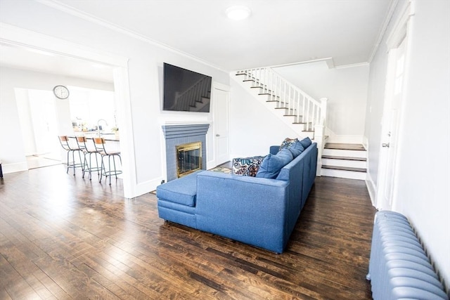 14 Fales St, Worcester, MA 01606 - living room featuring wood-type flooring, crown molding, baseboards, a glass covered fireplace, and stairs